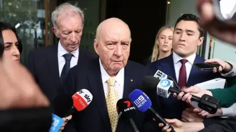 Indecent Assault Accusations Against Top Aussie Broadcaster Lessened